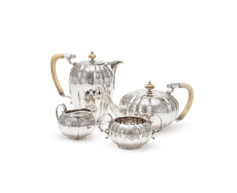 Y A SILVER FOUR PIECE LOBED CIRCULAR TEA SET MAPPIN & WEBB, SHEFFIELD 1931 (1) AND 1932 (3) The tea and hot water pots with i