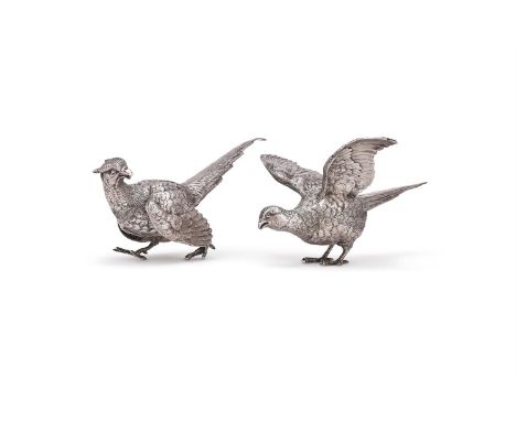 A PAIR OF SILVER MODELS OF PHEASANTS SPONSOR'S MARK LAG, LONDON 1977 28cm (11in) and 30cm (12in) long 1991g (64 oz)  Conditio