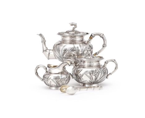 Y A CASED CHINESE SILVER FOUR PIECE TEA SET MAKER'S MARK KC (NOT TRACED), CANTON CIRCA 1890 The tea pot with a bamboo finial 