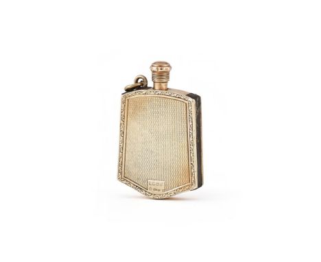 A 9 CARAT GOLD MATCH STRIKER IMPORT MARK LONDON 1930 With an engraved scroll border, engine turned decoration and a suspensio