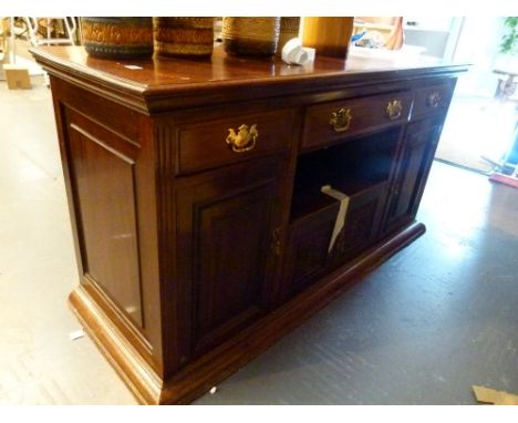 MAHOGANY SIDEBOARD. Mahogany sideboard with three drawers over three cupboards and a shelf