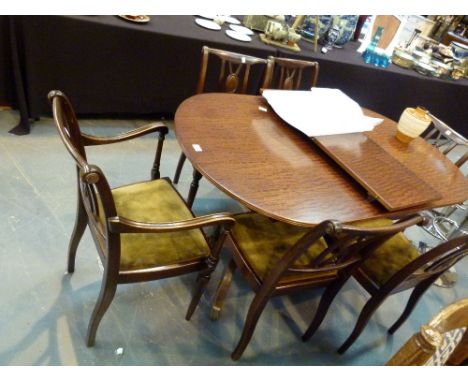 MAHOGANY TABLE. Mahogany table and five chairs with one carver