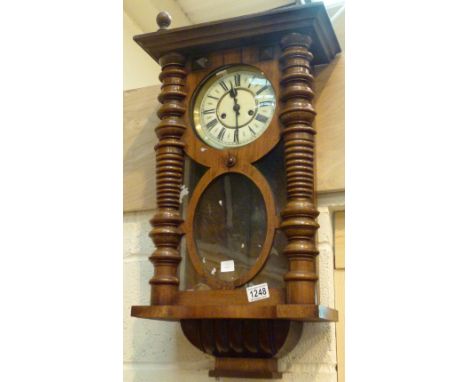 GUSTAV BECKER WALL CLOCK. Large wooden cased Gustav Becker wall clock with continental movement and ceramic dial 