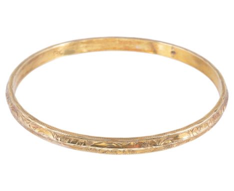A 9ct gold bangle