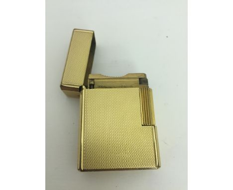 A gold plated Dupont lighter