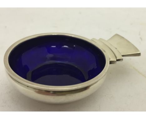 A stylish silver and royal blue enamel kovsch by Georg Jensen with stepped and angular handle