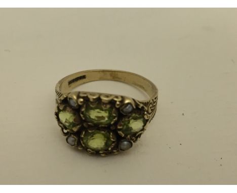 A 9ct gold peridot and pearl ring