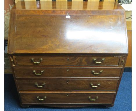 A 19th century mahogany writing bureau with fall front writing compartment over four long drawers on feet with casters, 104cm
