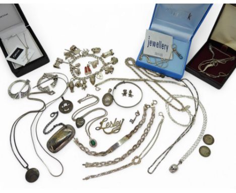 A collection of silver and white metal jewellery to include a silver charm bracelet, with owl and donkey charm among others, 