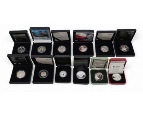 A lot comprising twelve 1 oz silver commemorative coins approximate weight 330 grams Condition Report:Available upon request