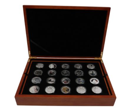 A coin collector's case containing 40 1 oz silver coins various designs Condition Report:Available upon request