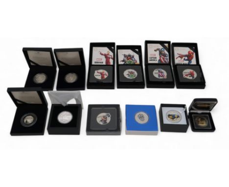 A lot comprising twelve 1 oz silver commemorative coins approximate weight 330 grams Condition Report:Available upon request