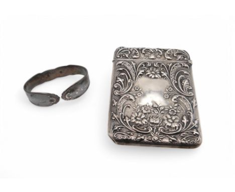 An Edwardian silver card case, by Cornelius Desormeaux Saunders &amp; Francis Hollings, Birmingham 1909, with embosssed scrol