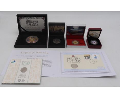 A lot of various commemorative coins to include a Rudolph The Red Nosed Reindeer silver, gold plated and ruby nosed with COA,