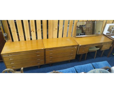 A mid 20th century teak Butilux three piece bedroom suite consisting mirror back dressing table and stool, 130cm high x 130cm