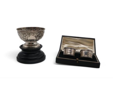 A silver sugar bowl, by George Nathan &amp; Ridley Hayes, Chester 1889, on a turned wooden base, and a cased pair of George V