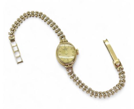 A 9ct gold ladies Rotary quartz and strap weight including mechanism 10.4gms Condition Report:Available upon request