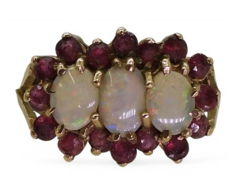 A 9ct gold opal and ruby cluster ring, size P1/2, weight 3.1gms Condition Report:Available upon request