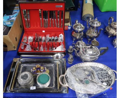An Onedia cutlery canteen, a four piece tea service, another teapot, trays, casters, loose cutlery etc Condition Report:Avail