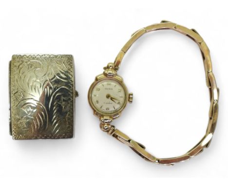 A 9ct gold ladies Olma watch and strap, weight including mechanism 14.5gms, together with a silver pill box Condition Report: