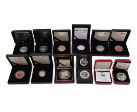 A lot comprising twelve 1 oz silver commemorative coins approximate weight 330 grams Condition Report:Available upon request
