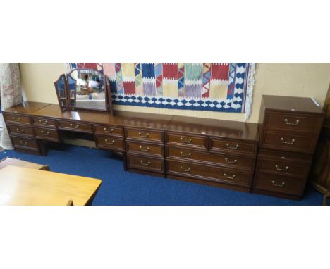 A large 20th century mahogany veneered bedroom suite consisting mirror backed dressing table, 128cm high x 143cm wide x 46cm 