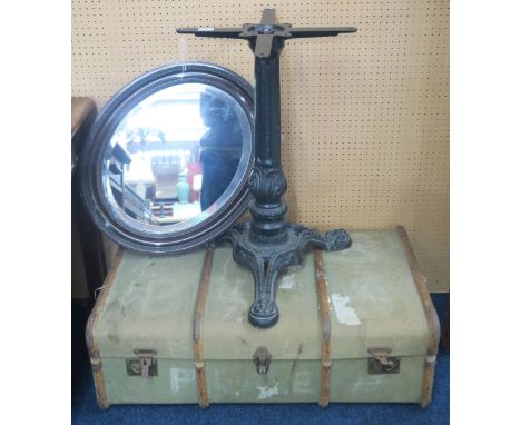 A lot comprising a 20th century cast iron pub table base, Victorian oval frame wall mirror and a wood bound travel trunk (3) 