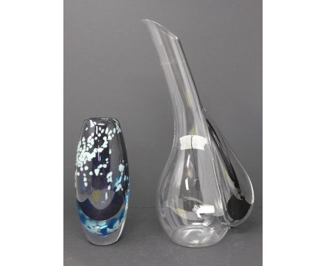 A glass vase/decanter with black handle, H.37cm, and an Art Glass vase with mottled decoration, H.21cm (2)