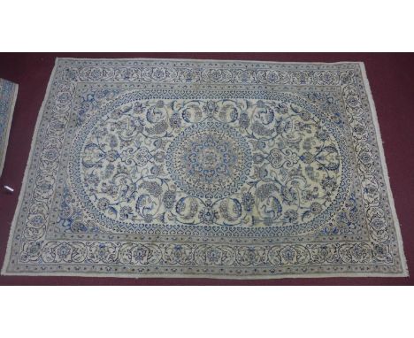 A 20th century Isfahan Nain carpet with floral design on a cream ground, 300 x 198cm 