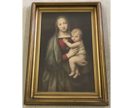 A vintage gilt framed print of Madonna and child. Framed and glazed. Image size 55 x 36cm