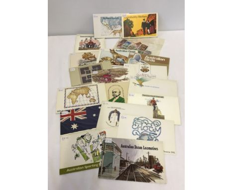 A collection of 21 Australian first issue stamp presentation packs. To include sporting personalities plus some loose Interna