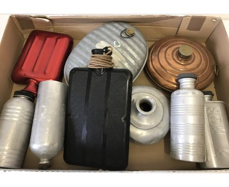 A quantity of mostly metal vintage hot water bottles. To include Bakelite early electric warmer and copper & brass water bott