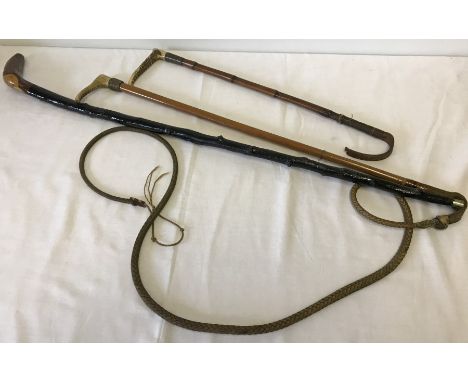 A vintage riding crop, a combined crop/pony & trap whip, and a walking stick.  