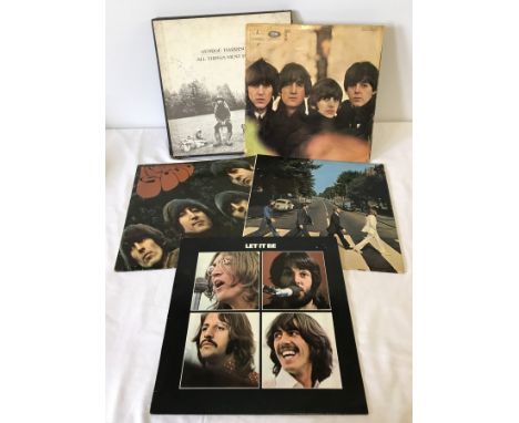 4 Beatles albums together with a George Harrison box set album. Rubber Soul, 1965 first pressing on Mono. Beatles for Sale, 1