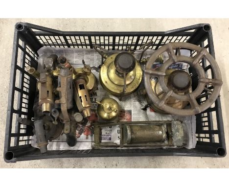A collection of metal ware, mostly brass. To include 2 vintage primus stoves, 2 blow lamps, candlestick, plant sprayer and fo