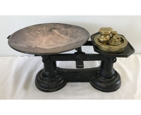 A set of vintage scales with copper bowl and brass weights  