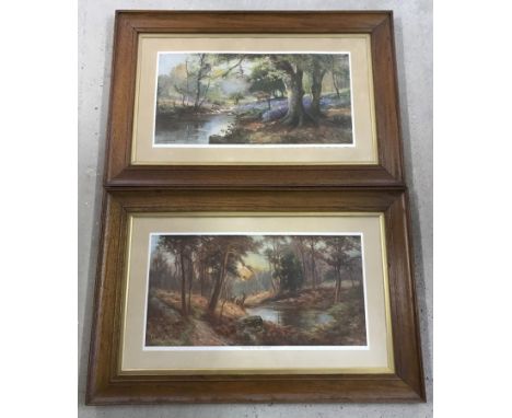 A pair of vintage oak framed and glazed woodland wildlife prints by Douglas Graham. Titled "A Forest Glade" & "Autumn in the 