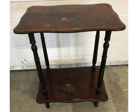 A side/hall table with painted oriental bird and flower design to top and shelf.  Approx 50.5 x 37.5 x 60 cm tall.