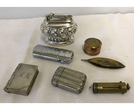 A small collection of assorted items to include vesta cases and a Ronson Crown table lighter.  