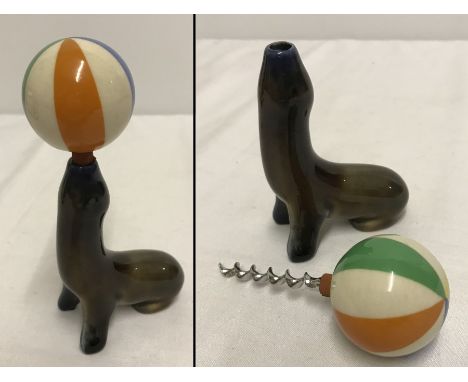 A  vintage Wade Seal balancing a ball novelty corkscrew.  