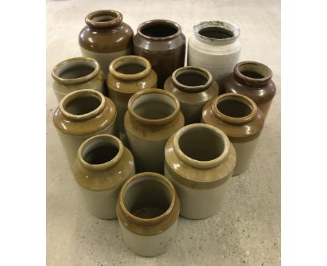 A quantity of 13 vintage stoneware jars and bottles.  