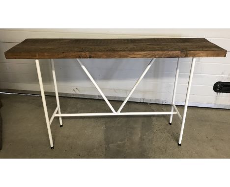 A custom made console table with white metal base and 40mm driftwood top. Rrp £ 350.  140 x 40 x 82 cm tall approx.