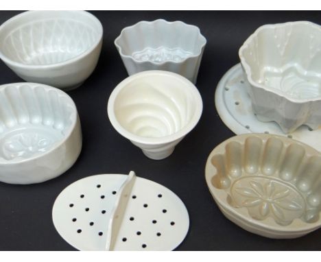 ASSORTED VINTAGE WHITE GLAZED POTTERY JELLY MOULDS &amp; TWO DRAINERS