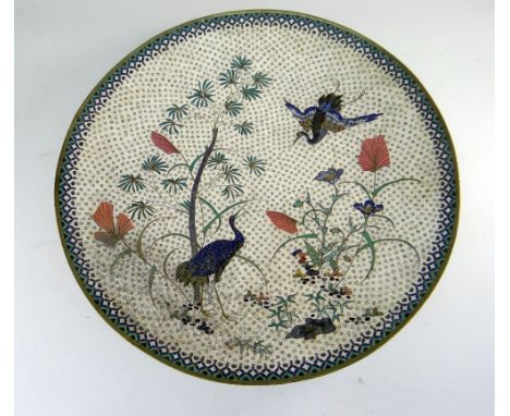 JAPANESE CLOISONNE ENAMEL CHARGER, MEIJI PERIOD, depicting two Manchurian cranes amid foliage within brocade border, 45cms di