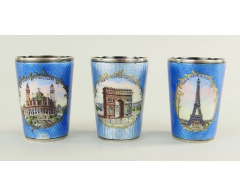 THREE GERMAN SILVER GILT &amp; GUILLOCHE ENAMEL VODKA CUPS, 935 standard, coronet and fir tree marks, each decorated with a v