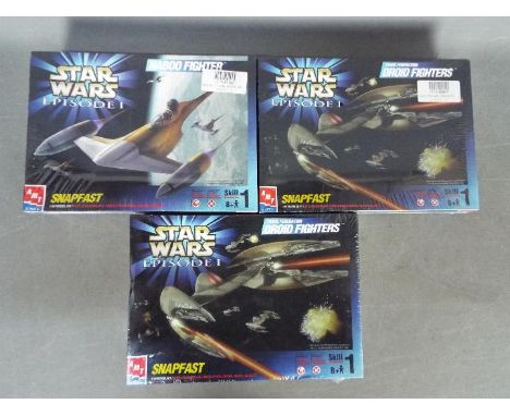 Star Wars, AMT, ERTL - Three boxed Star Wars Episode 1 plastic model kits in 1:48 scale from AMT. Lot includes #30118 Trade F