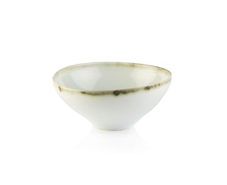 Edmund de Waal (b.1964)Footed bowlporcelain, with a celadon glaze and green rimimpressed potter's seal7.5cm high x 17.5cm dia
