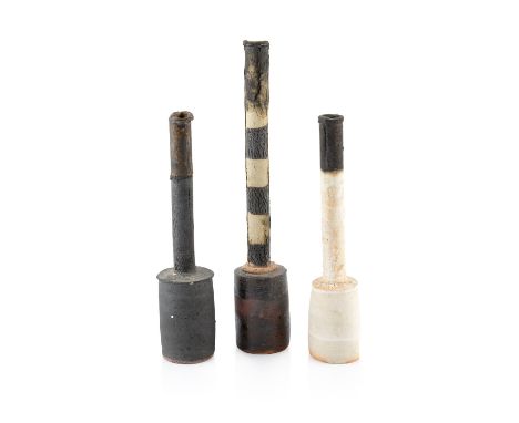 Robin Welch (1936-2019)Three bottlesstoneware, with black and white banded glazesimpressed potter's sealtallest 29cm high (3)