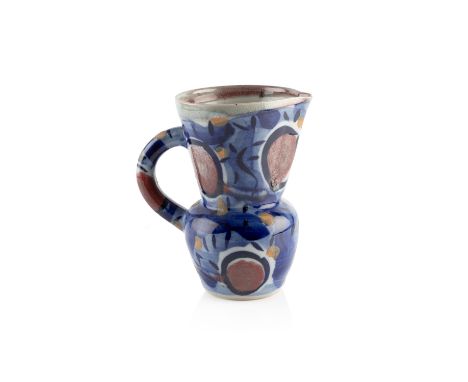 Janice Tchalenko (1942-2018) Jugwith flaring rim, with abstract decoration on a dark blue groundunmarked18cm high.  At presen