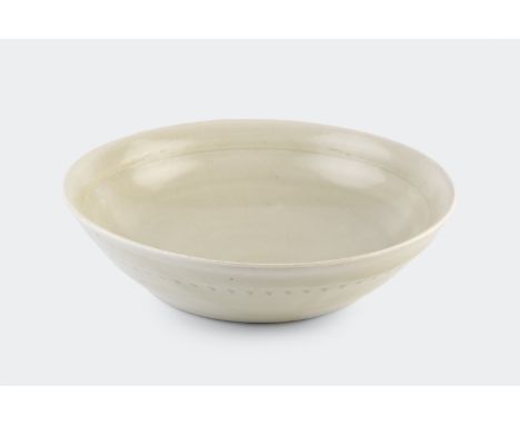 Richard Batterham (1936-2021) Bowlporcelain with celadon coloured glazeunmarked5cm high x 20cm diameter.  Minimal crazing and